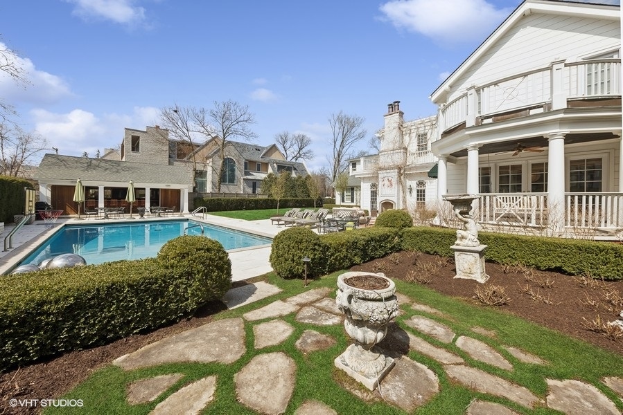 710 South County Line Road Hinsdale, IL 60521 - Photo 55 of 63 a front view of a house with a yard