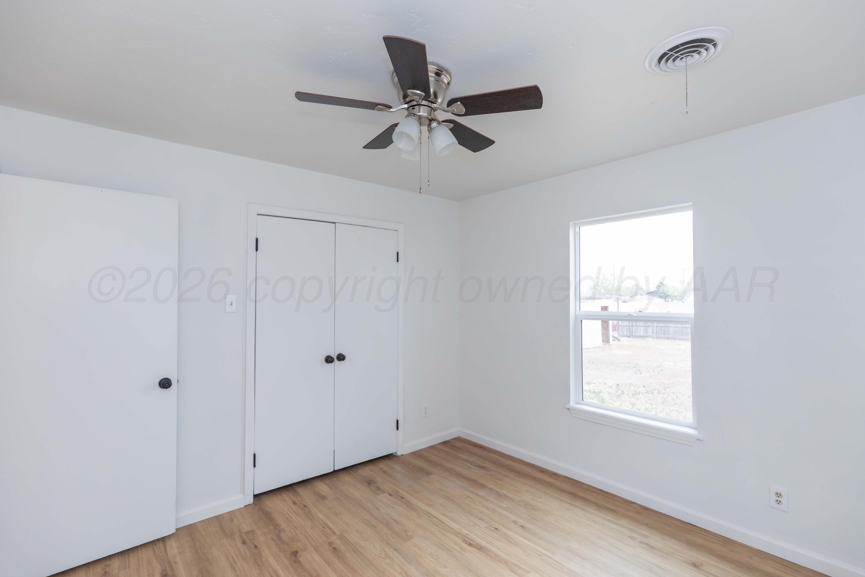 205 South Forest Street Amarillo, TX 79106 - Photo 18 of 29 a view of an empty room with a window