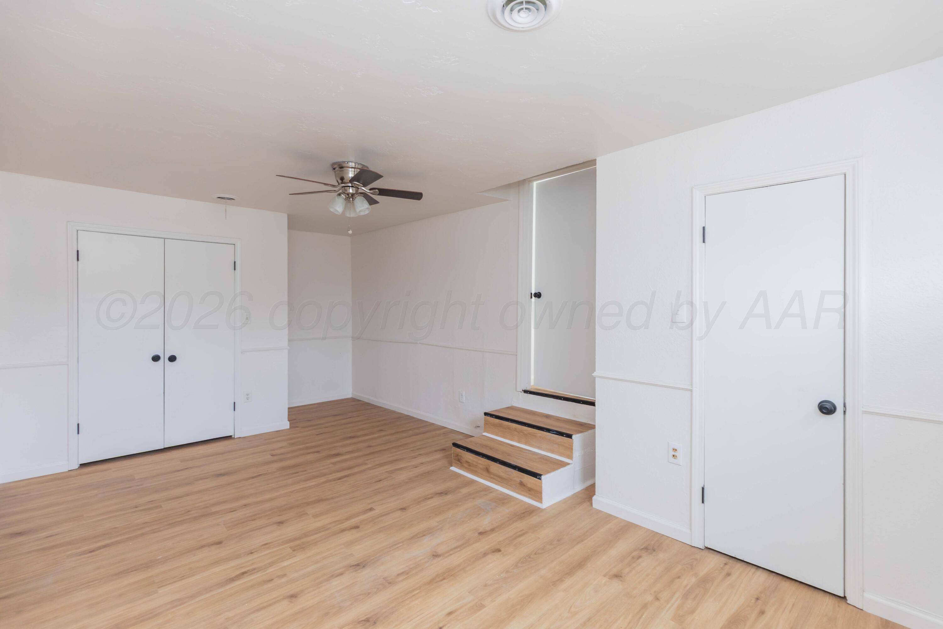 205 South Forest Street Amarillo, TX 79106 - Photo 21 of 29 wooden floor in an empty room