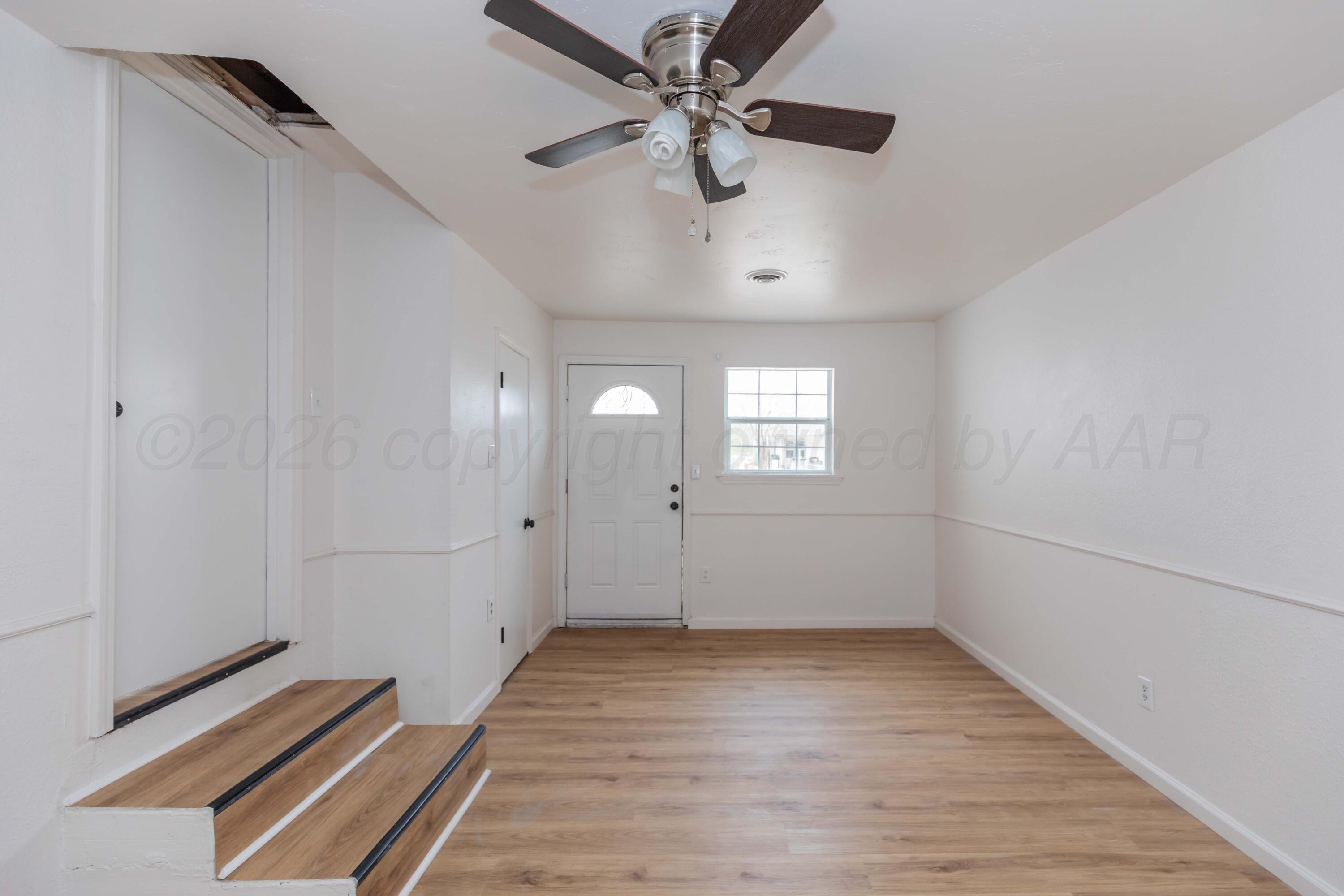 205 South Forest Street Amarillo, TX 79106 - Photo 22 of 29 a view of an empty room with a window