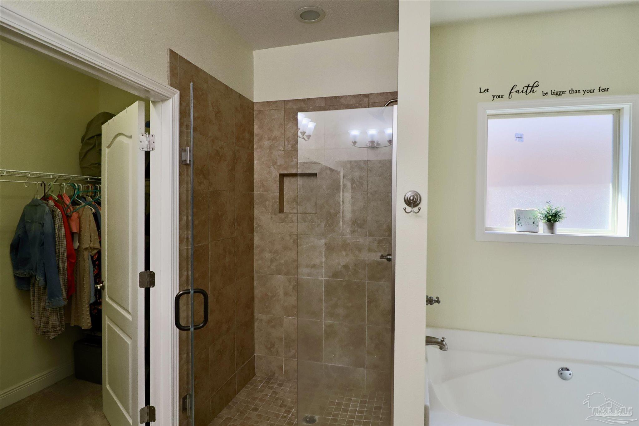 3934 Fielding Court Pace, FL 32571 - Photo 24 of 49 a bathroom with a shower