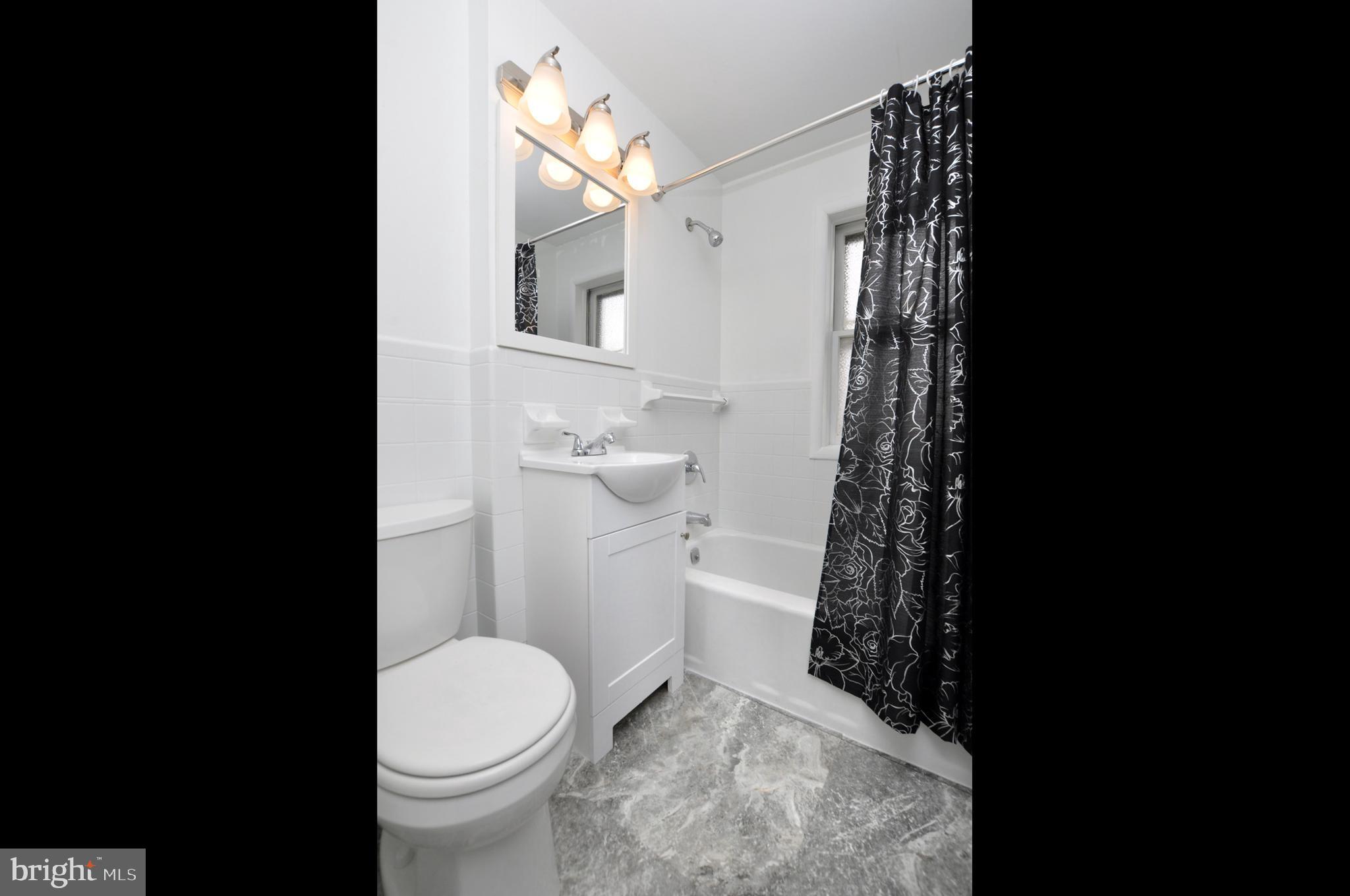 3069 South Chesapeake Road Camden, NJ 08104 - Photo 13 of 30 a bathroom with a toilet and a shower