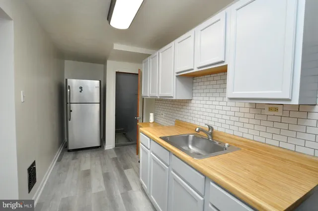 a view of a bathroom from the hallway