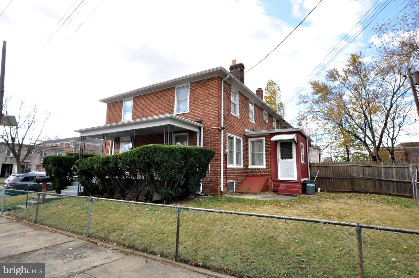 3069 South Chesapeake Road Camden, NJ 08104 - Photo 4 of 30 a front view of a house with a yard