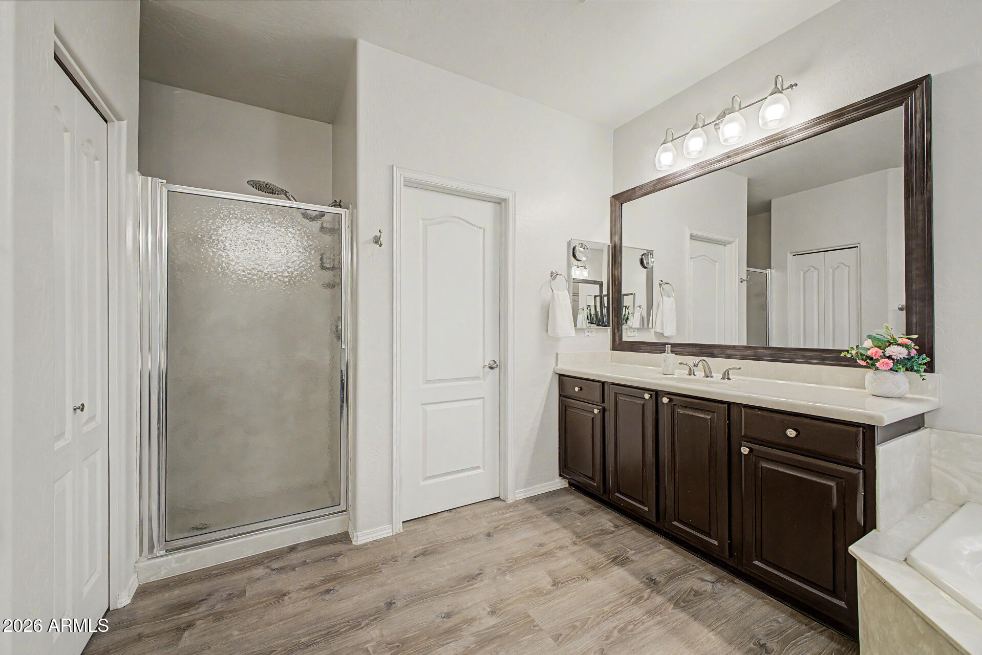 1124 North Robin Lane Mesa, AZ 85213 - Photo 15 of 87 a bathroom with a double vanity sink mirror and
