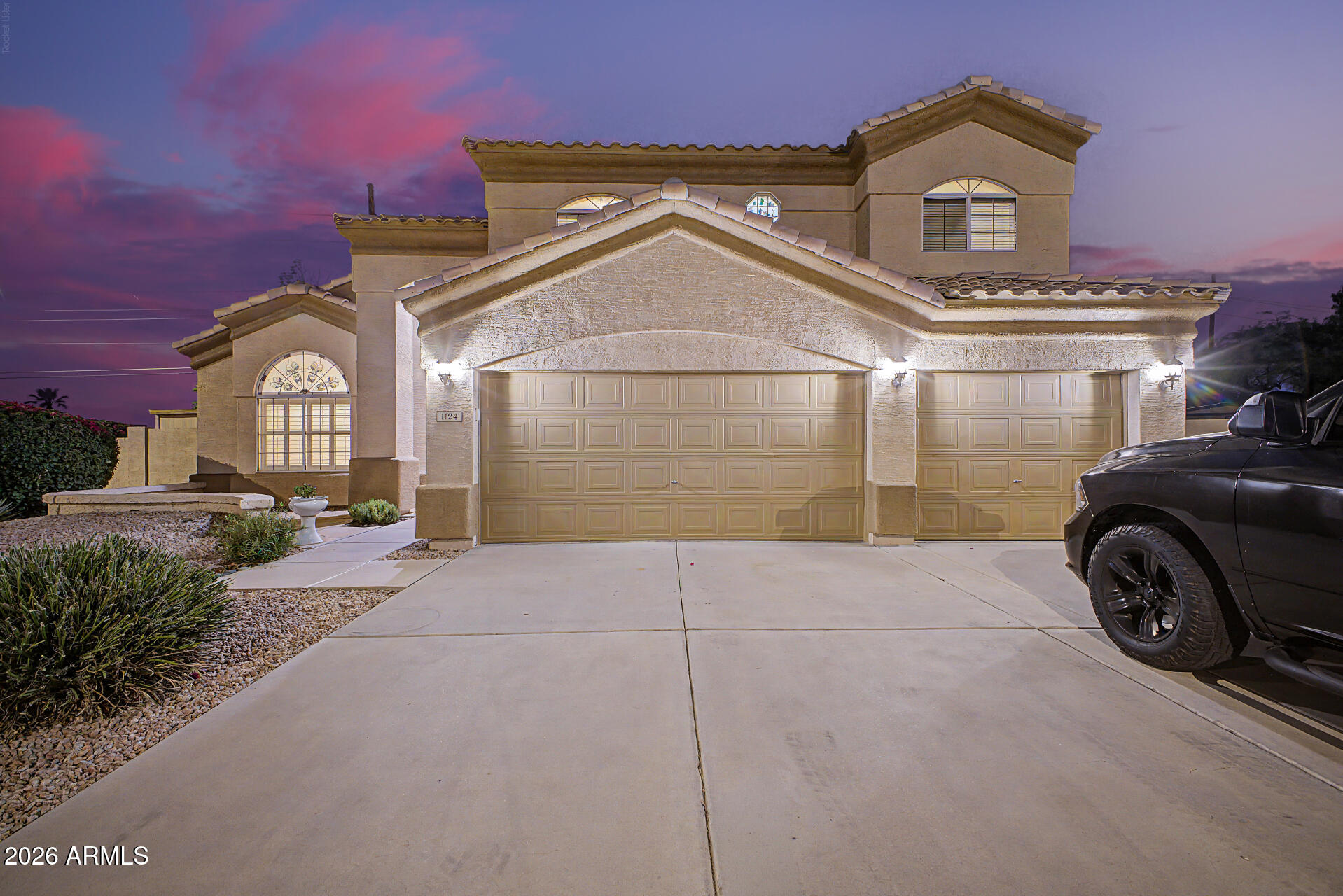1124 North Robin Lane Mesa, AZ 85213 - Photo 31 of 87 a view of a house with a street