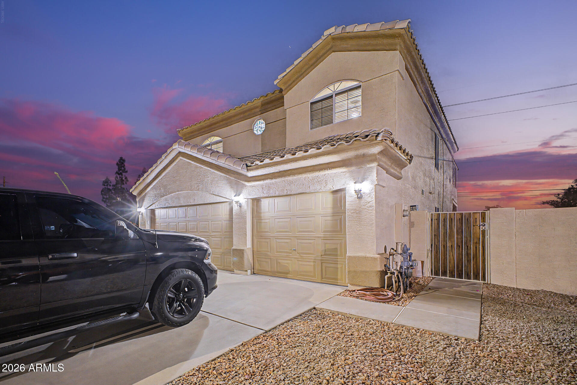 1124 North Robin Lane Mesa, AZ 85213 - Photo 34 of 87 a front view of a house with parking space