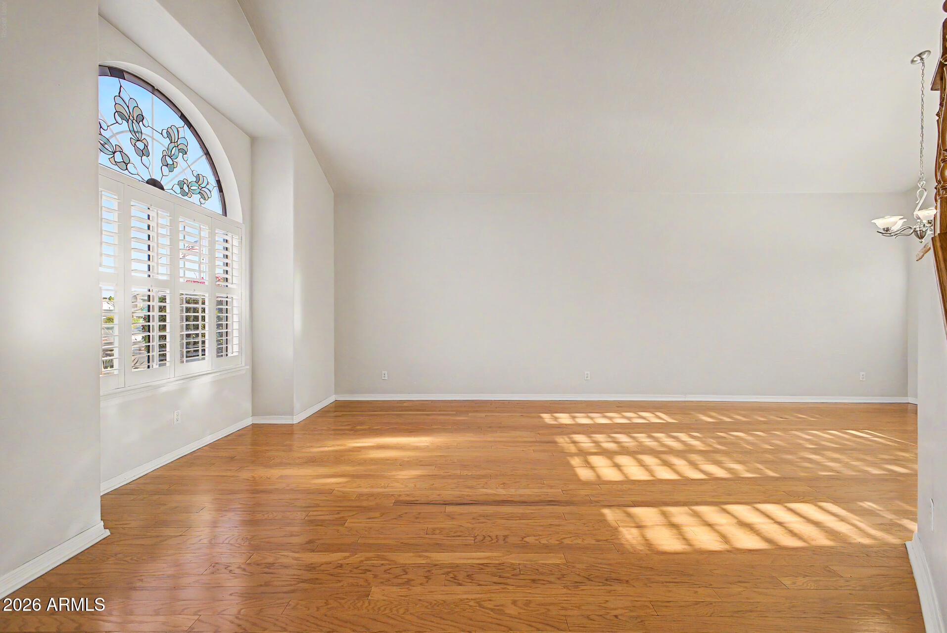 1124 North Robin Lane Mesa, AZ 85213 - Photo 47 of 87 a view of an empty room with a window