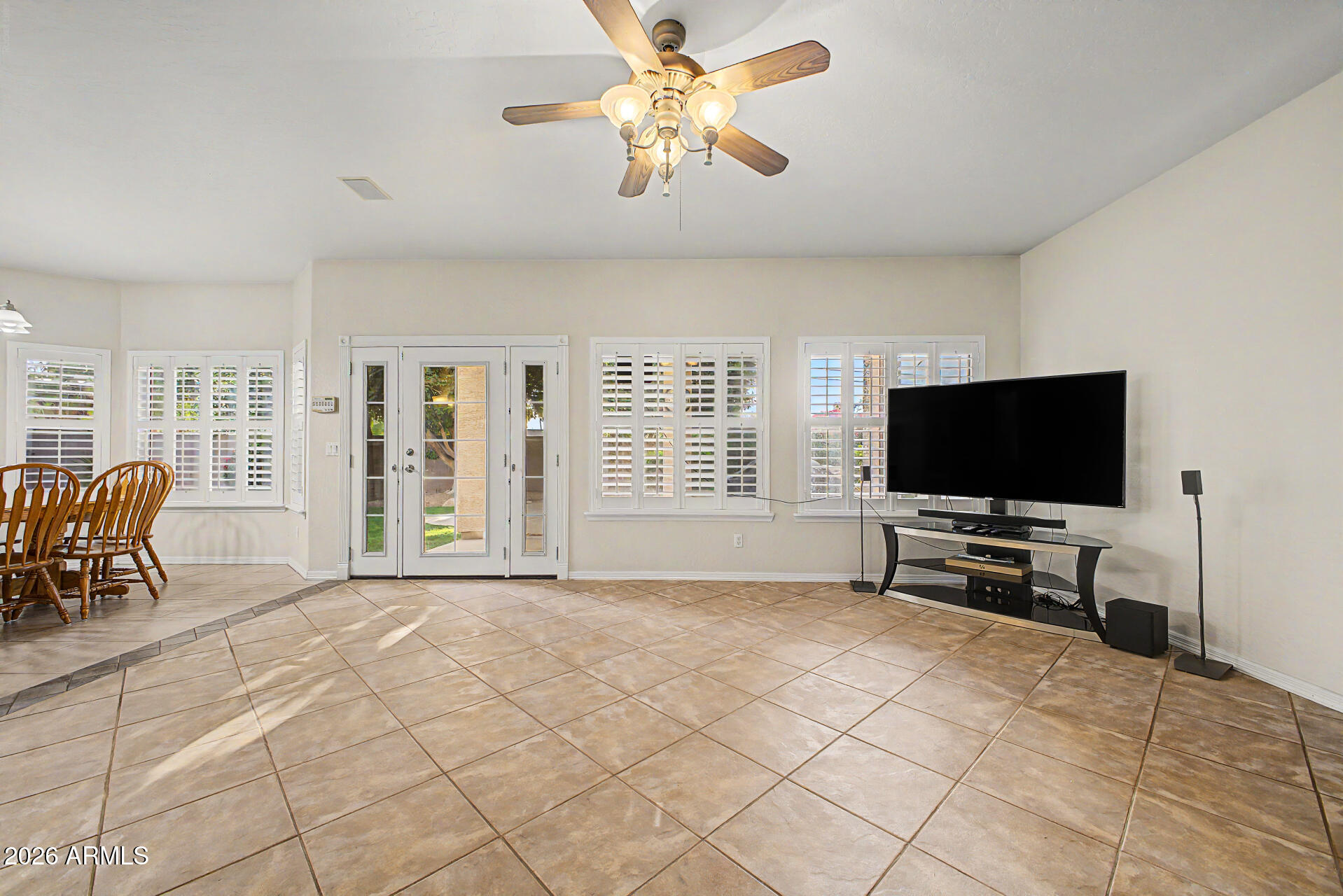 1124 North Robin Lane Mesa, AZ 85213 - Photo 53 of 87 a living room with furniture and flat screen tv