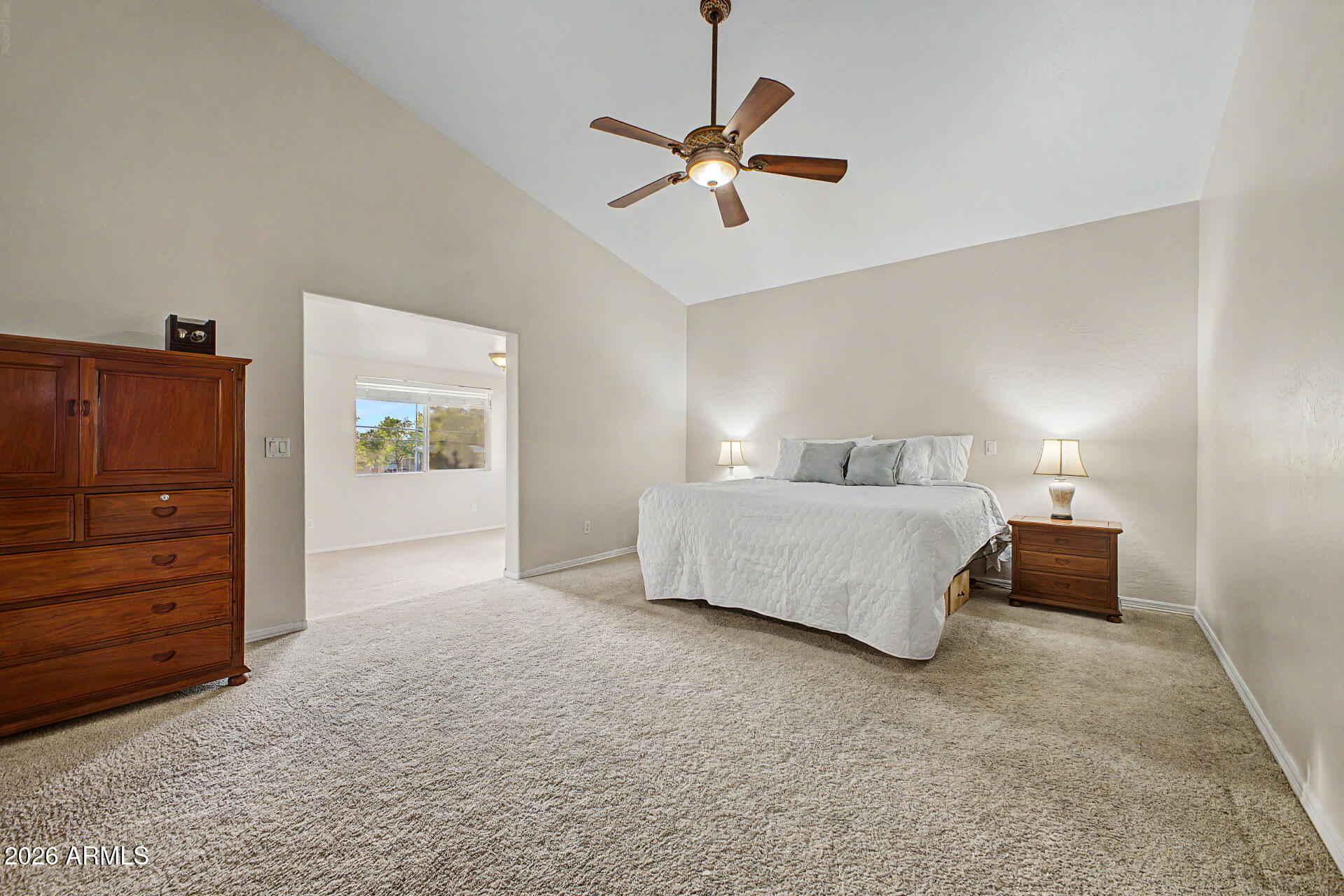 1124 North Robin Lane Mesa, AZ 85213 - Photo 86 of 87 a bedroom with a bed and a dresser