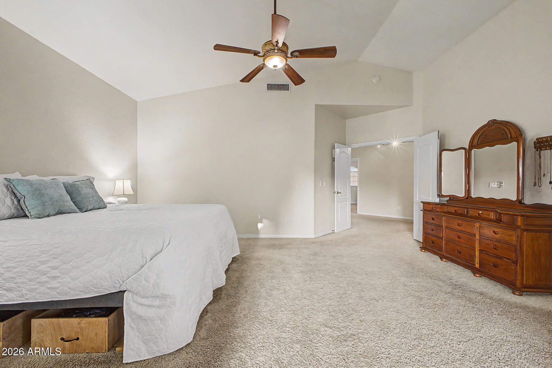 1124 North Robin Lane Mesa, AZ 85213 - Photo 87 of 87 a bed room with a bed and a dresser