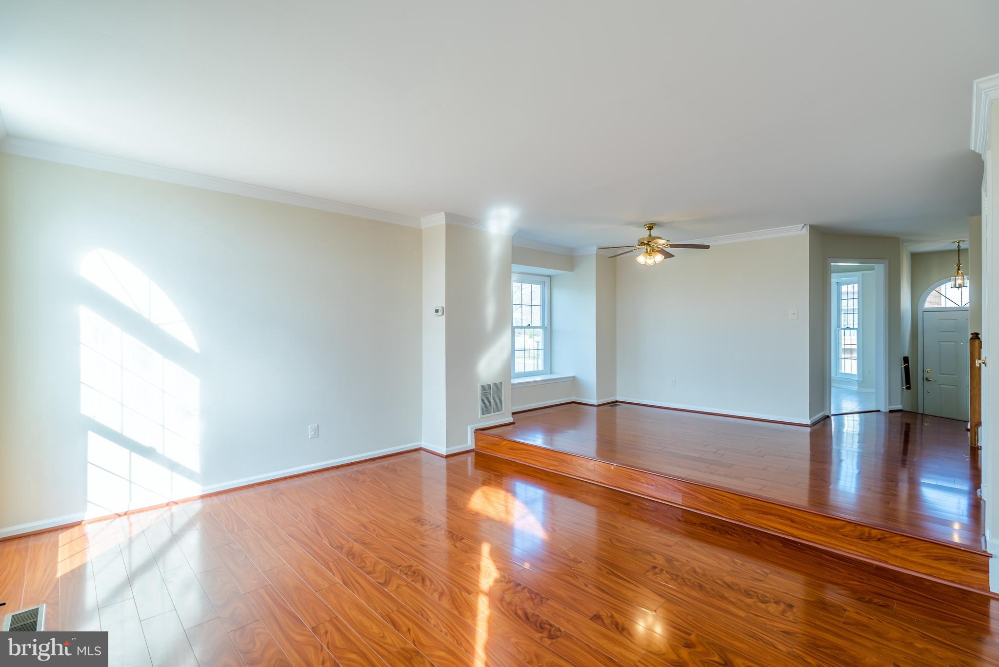 46869 Rabbitrun Terrace Sterling, VA 20164 - Photo 9 of 29 Open Concept Family Room Leads to Dining Room