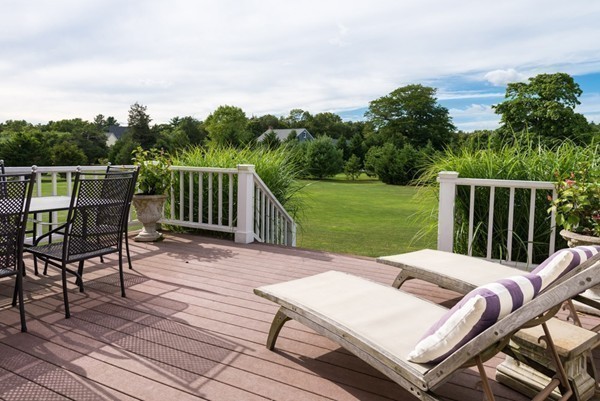 95 Bullivant Farm Road Marion, MA 02738 - Photo 16 of 19 a view of a patio with a table and chairs