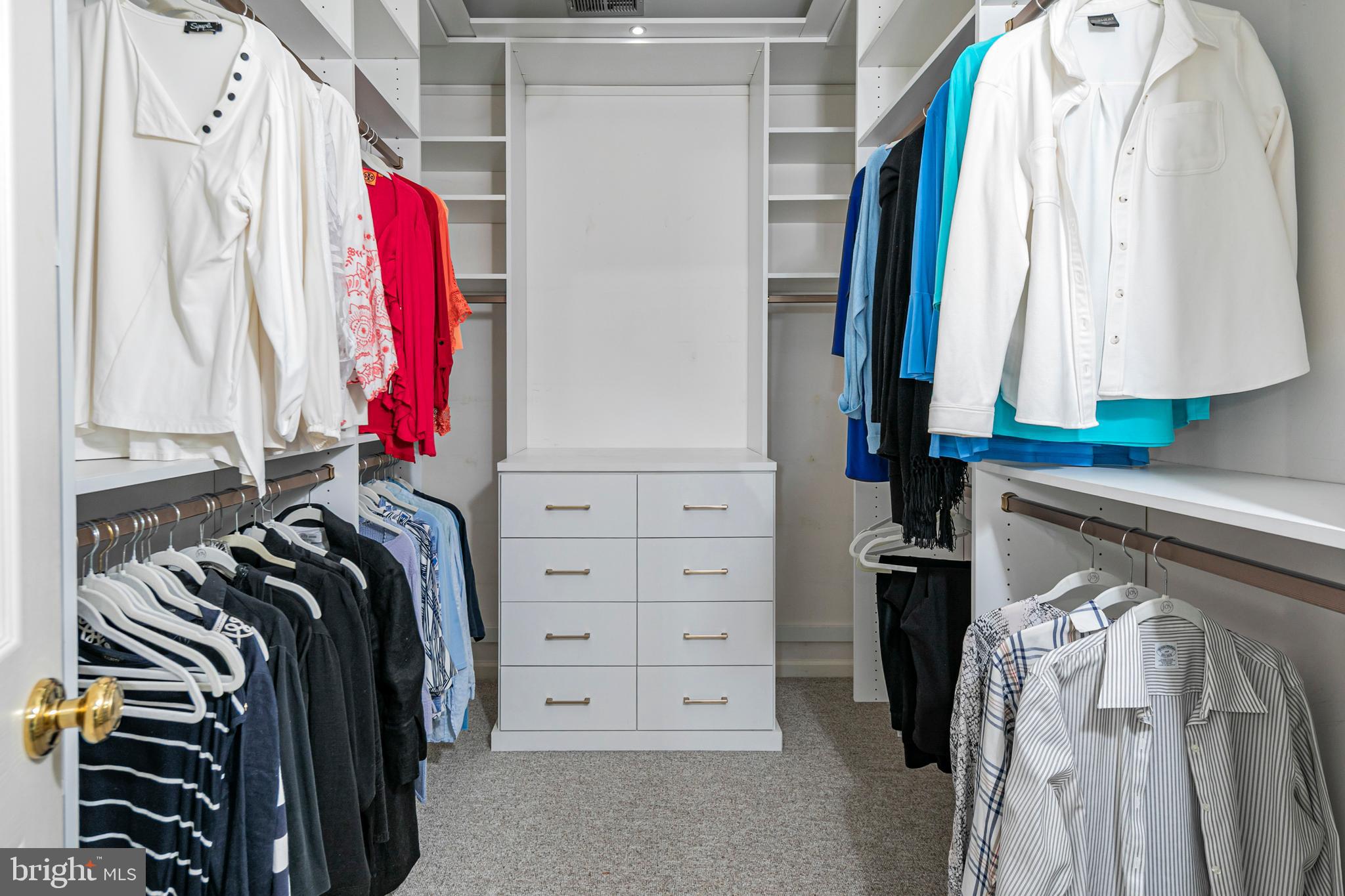 24 Foster Road Pennington, NJ 08534 - Photo 20 of 38 a view of walk in closet with clothes and shoes
