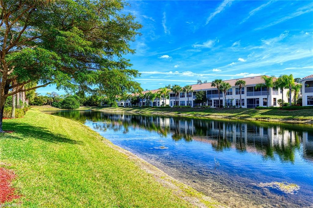 988 Hampton Circle Naples, FL 34105 - Photo 20 of 20 a view of a lake with houses