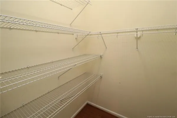 a view of a room with racks on the wall