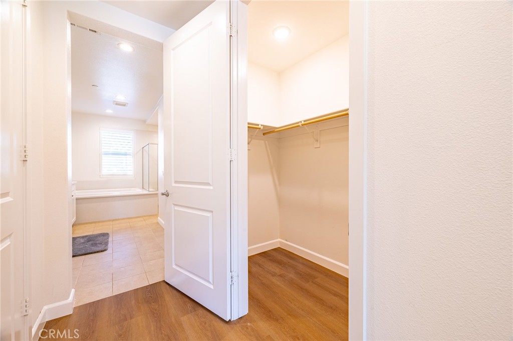 172 Follyhatch Irvine, CA 92618 - Photo 22 of 39 a view of empty room with wooden floor