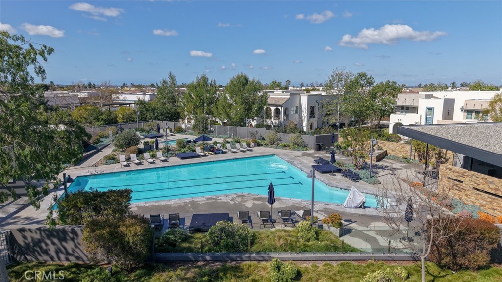 172 Follyhatch Irvine, CA 92618 - Photo 34 of 39 a view of a swimming pool with a patio