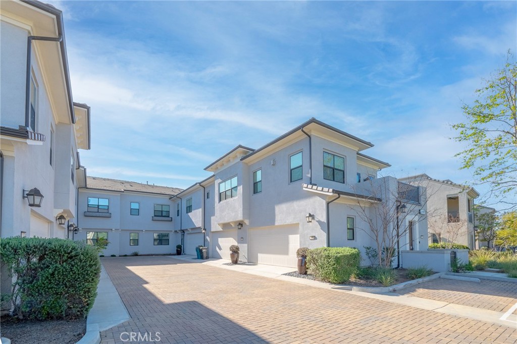 172 Follyhatch Irvine, CA 92618 - Photo 37 of 39 a front view of a house with a yard