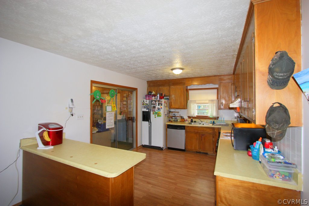 1387 Cartersville Road Cartersville, VA 23027 - Photo 10 of 22 Spacious kitchen with laminate flooring.