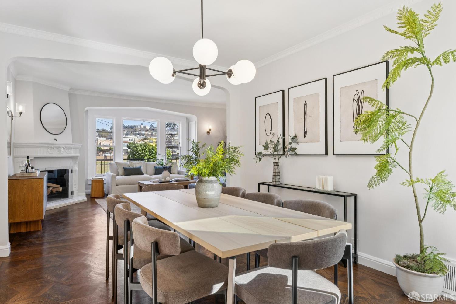 1675 29th Avenue San Francisco, CA 94122 - Photo 11 of 61 a view of a dining room with furniture a chandelier and wooden floor