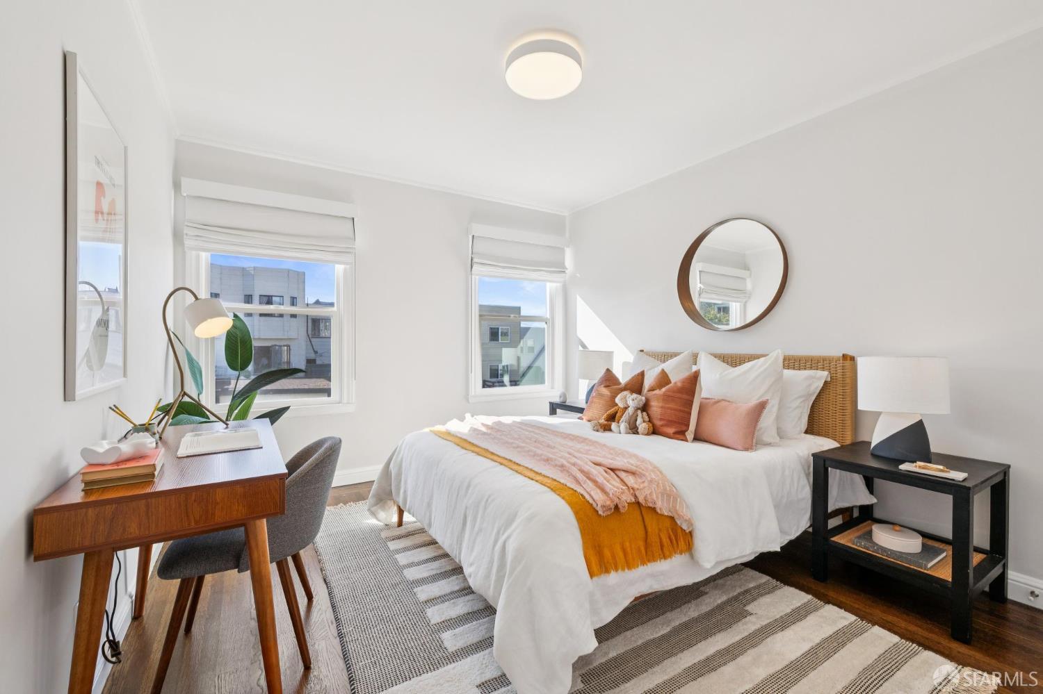 1675 29th Avenue San Francisco, CA 94122 - Photo 29 of 61 a bedroom with a bed and wooden floor