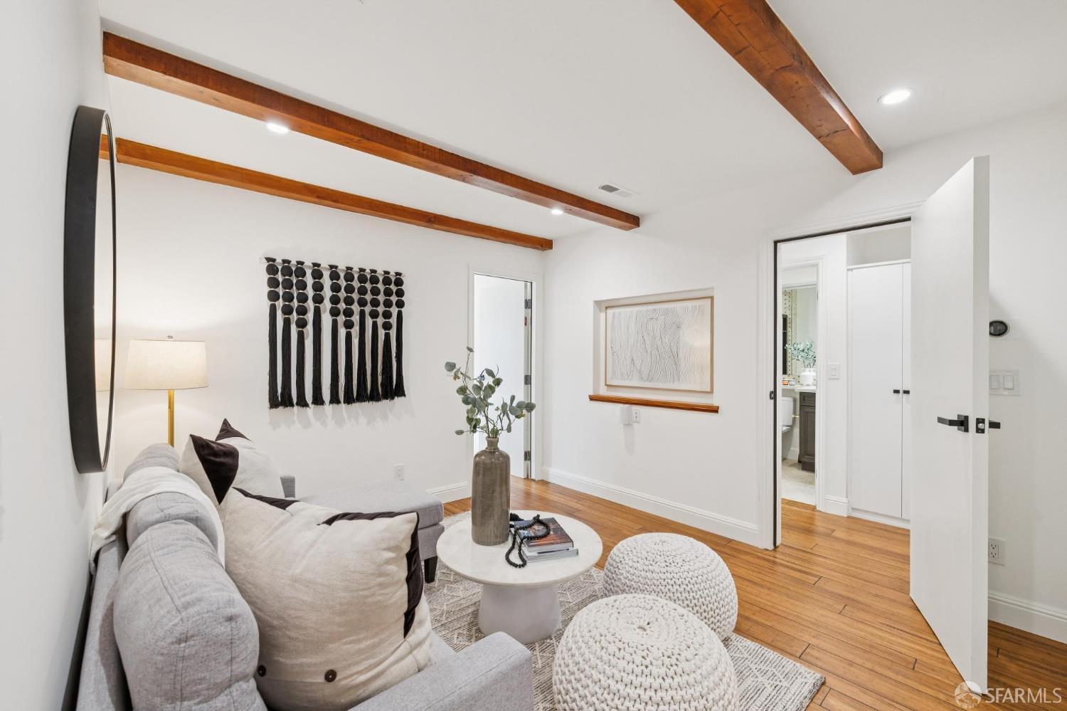 1675 29th Avenue San Francisco, CA 94122 - Photo 33 of 61 a living room with furniture and a window