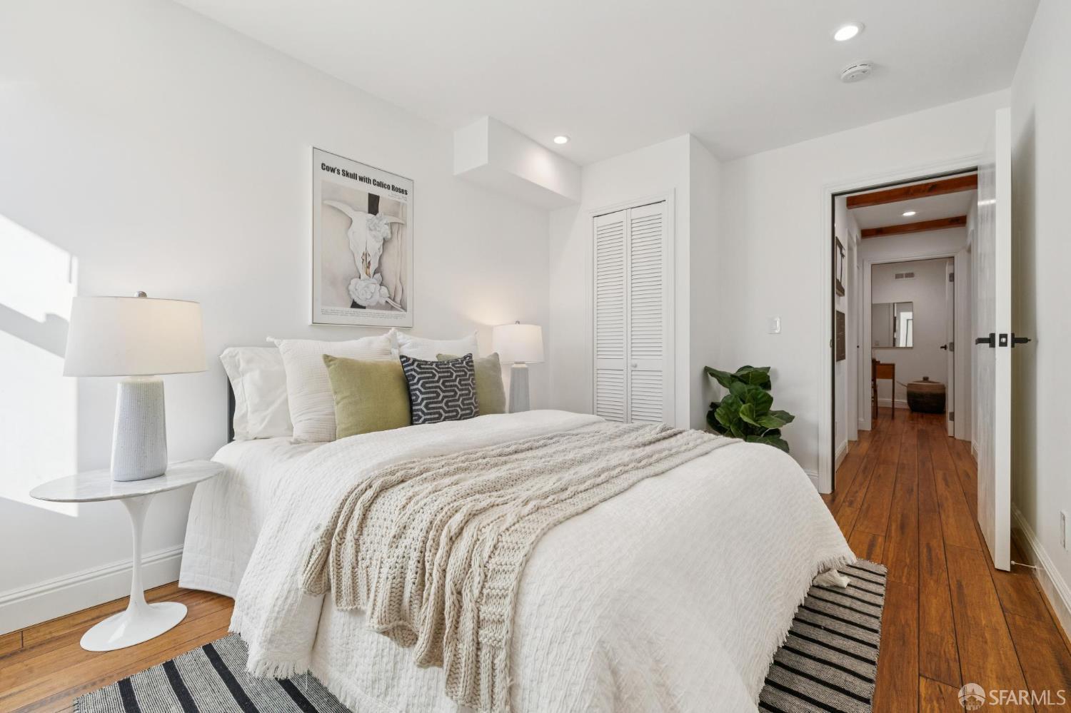 1675 29th Avenue San Francisco, CA 94122 - Photo 47 of 61 a bed room with a bed and a chair