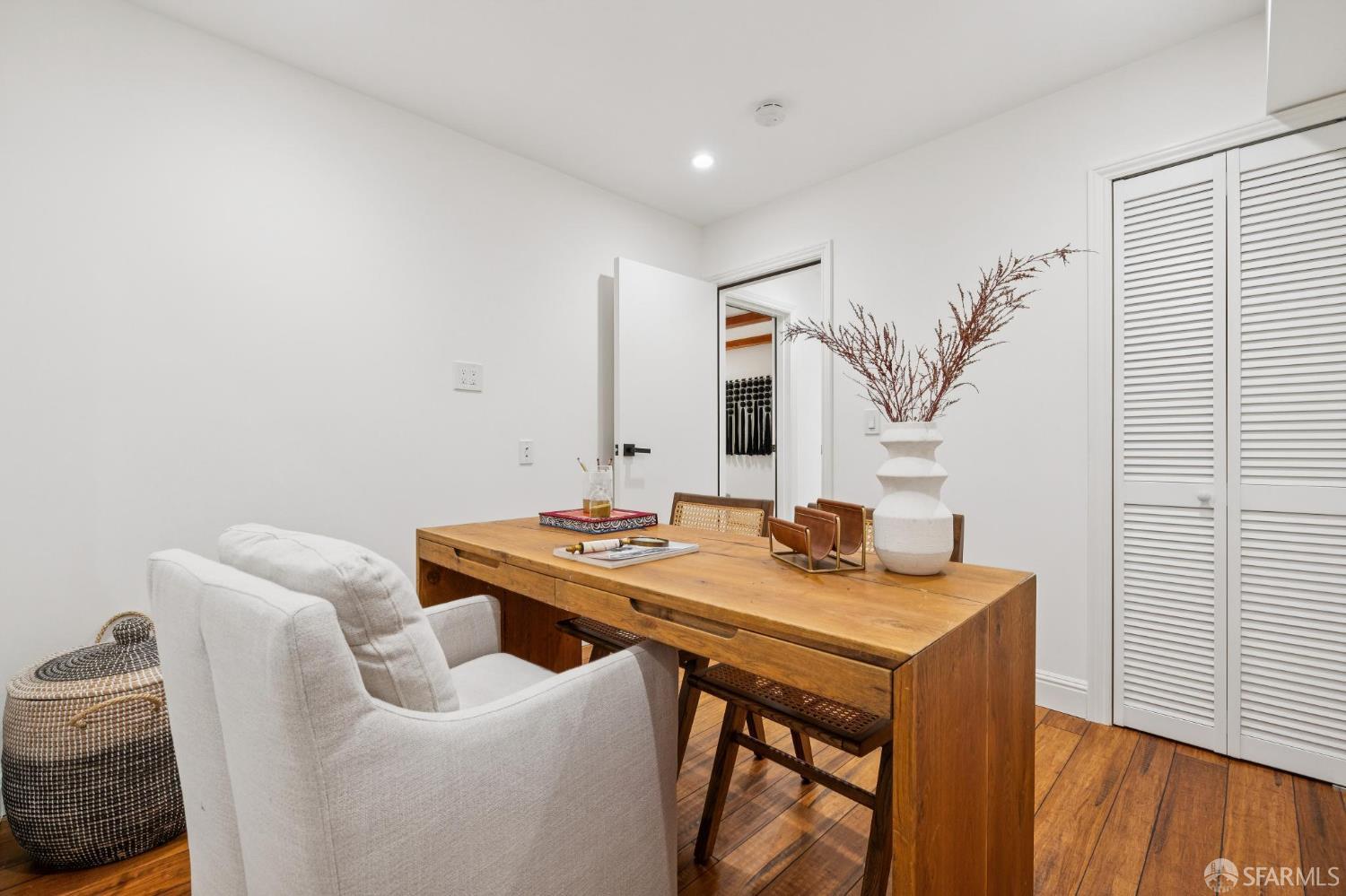 1675 29th Avenue San Francisco, CA 94122 - Photo 49 of 61 a view of a dining room with furniture and wooden floor