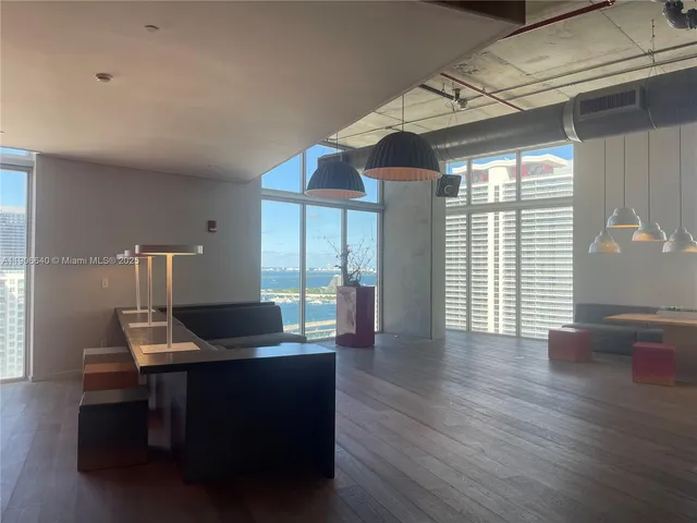 a view of balcony with wooden floor