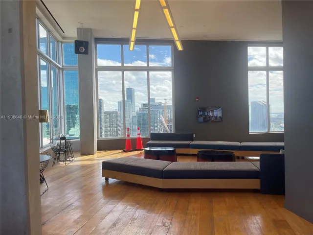 a view of a chairs and table in patio