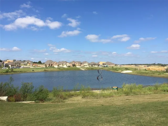 a view of an ocean from a city