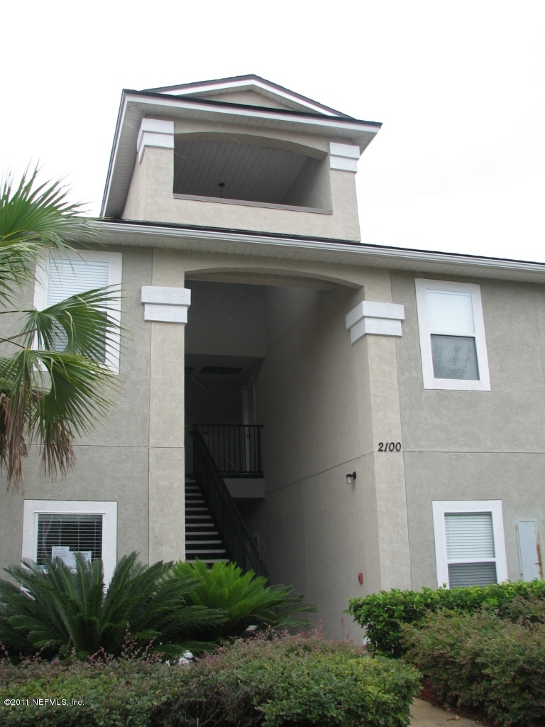 a top view of a house with a yard