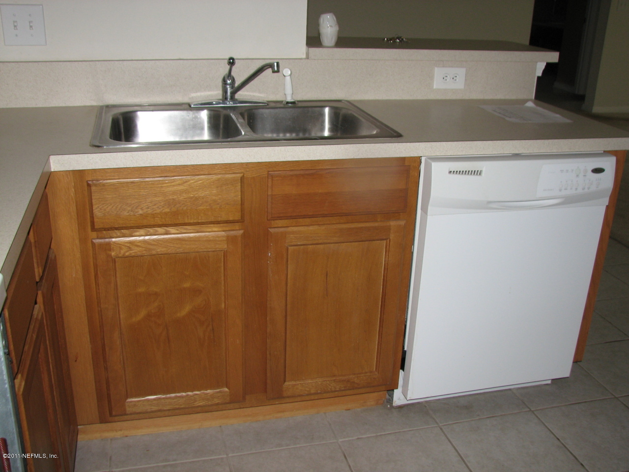 7920 Merrill Road, Unit 2108 Jacksonville, FL 32277 - Photo 11 of 15 a close view of sink and washer