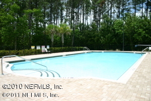 7920 Merrill Road, Unit 2108 Jacksonville, FL 32277 - Photo 15 of 15 a view of swimming pool with a yard