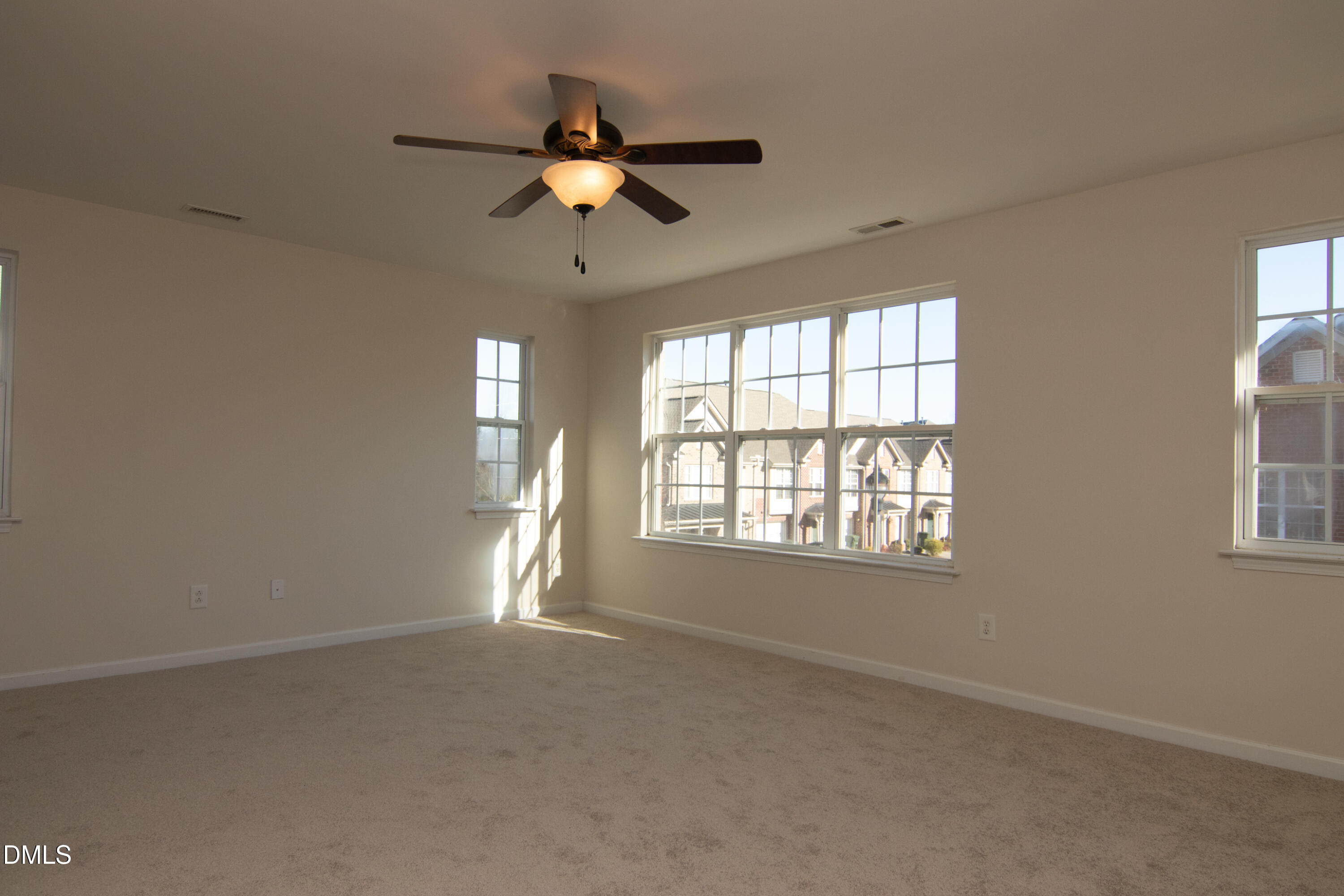 9903 Grettle Court Raleigh, NC 27617 - Photo 19 of 40 a view of an empty room with a window
