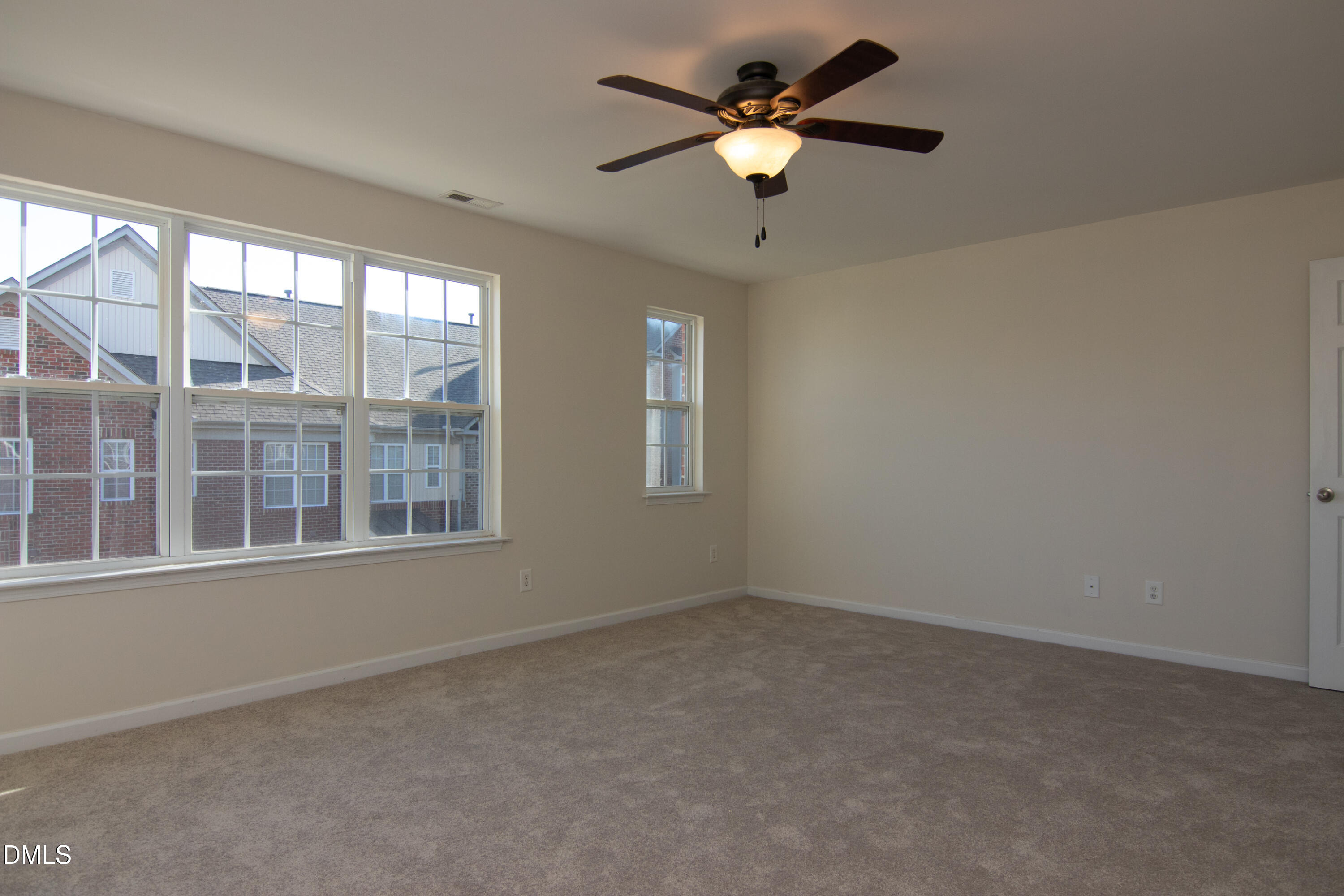 9903 Grettle Court Raleigh, NC 27617 - Photo 22 of 40 an empty room with a window