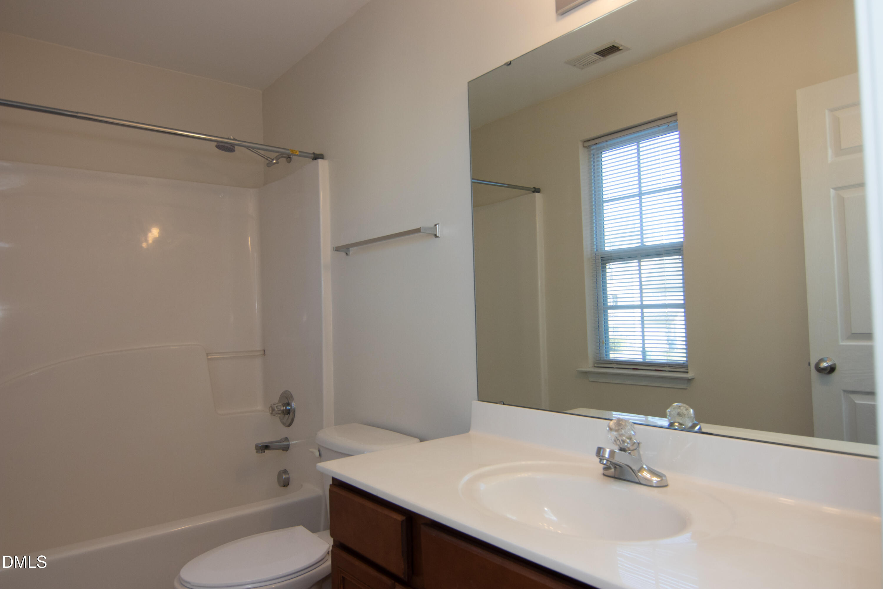 9903 Grettle Court Raleigh, NC 27617 - Photo 31 of 40 a bathroom with a sink toilet tub and shower