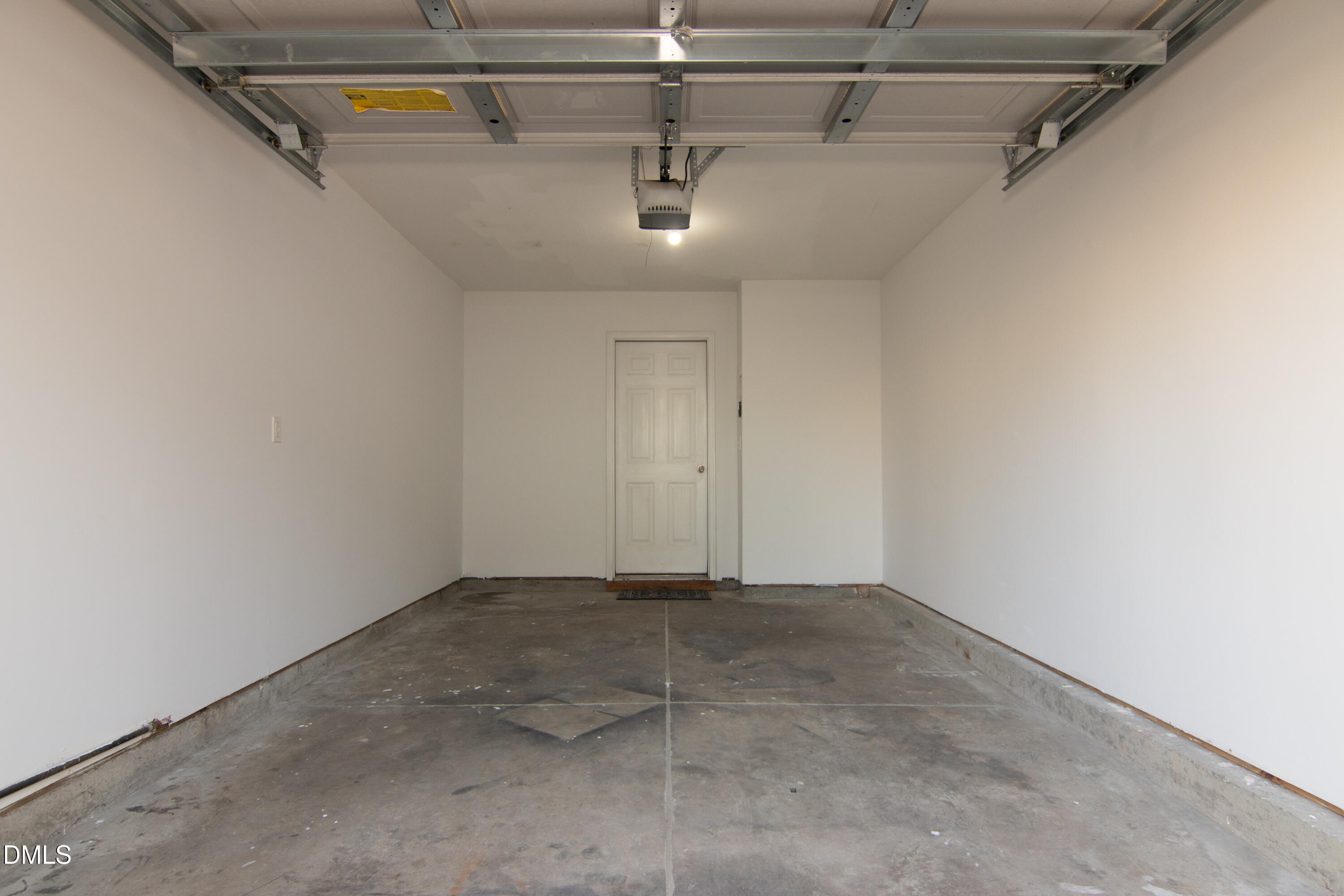 9903 Grettle Court Raleigh, NC 27617 - Photo 33 of 40 a view of a room with racks on the wall