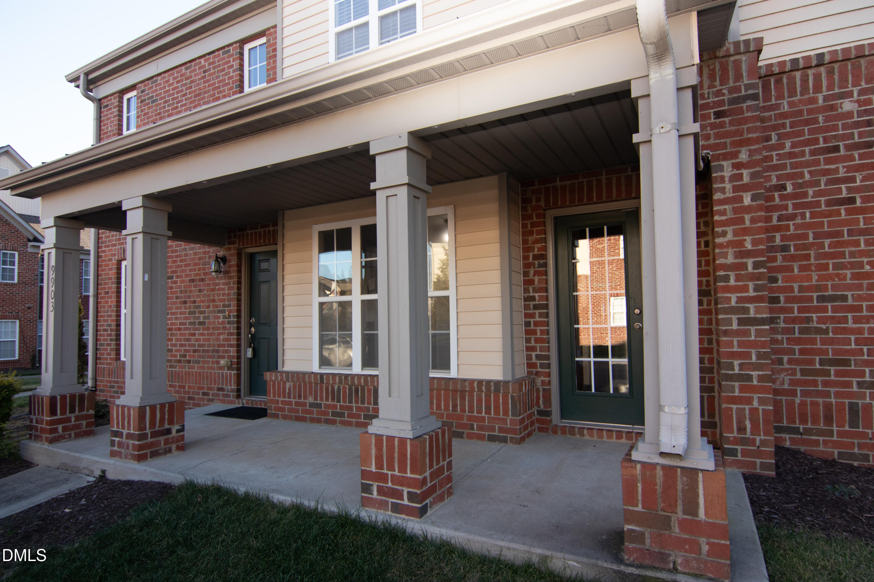 9903 Grettle Court Raleigh, NC 27617 - Photo 34 of 40 a front view of a house with a porch