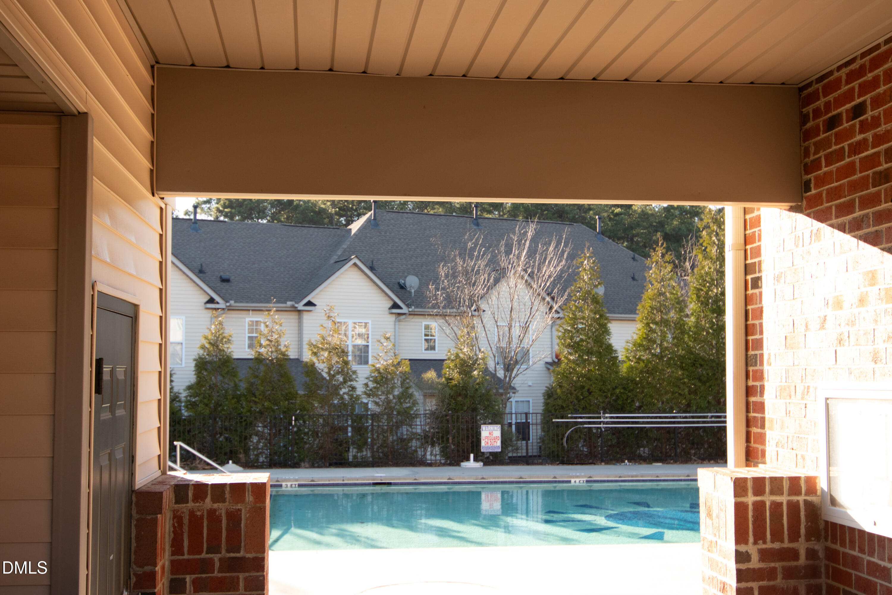 9903 Grettle Court Raleigh, NC 27617 - Photo 36 of 40 a view of swimming pool with outdoor seating