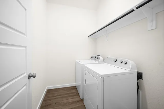a utility room with dryer and washer