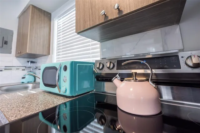 a bathroom with a sink and mirror