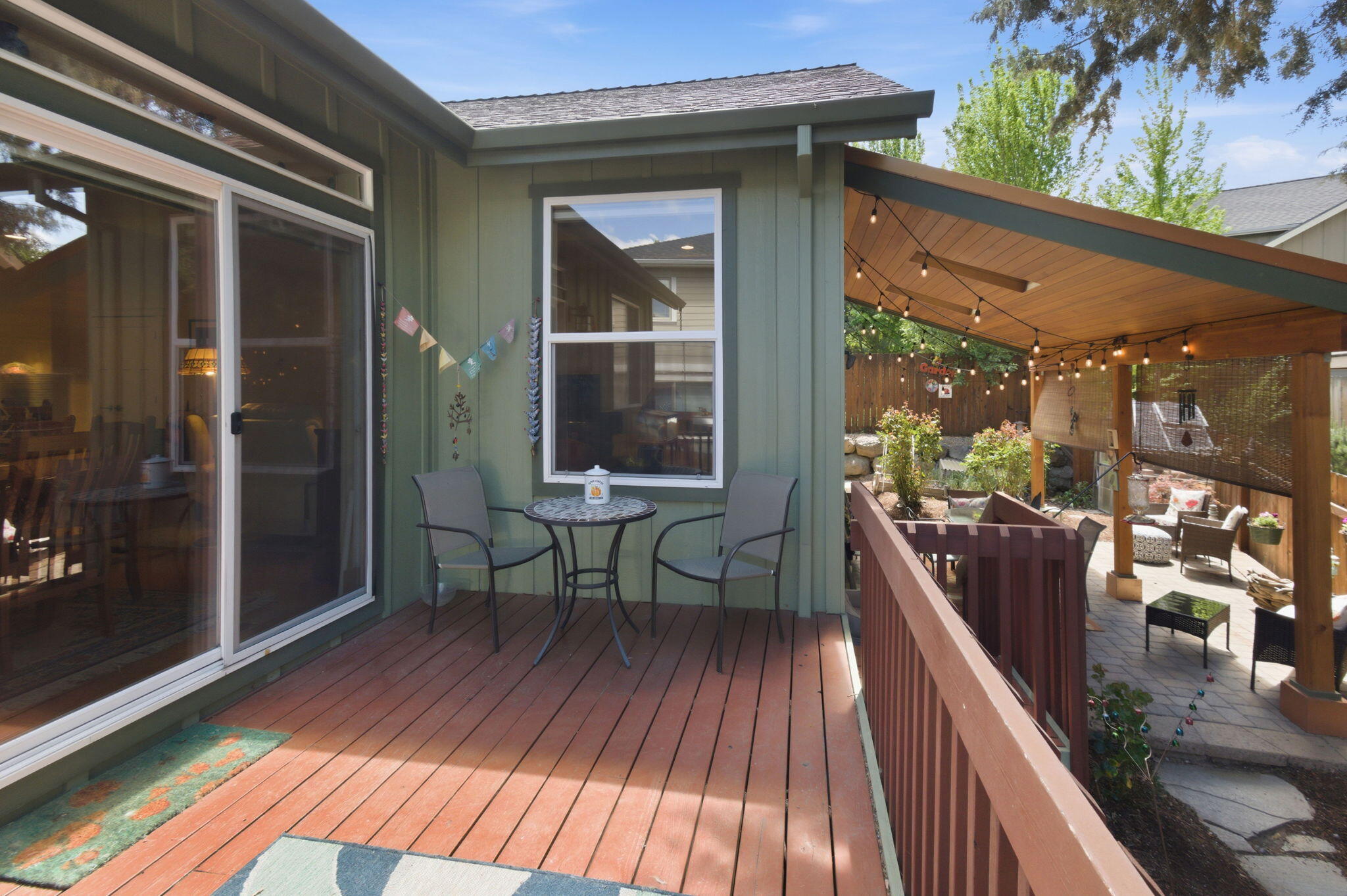 62944 Fresca Street Bend, OR 97703 - Photo 21 of 32 a view of a balcony with chairs and a table