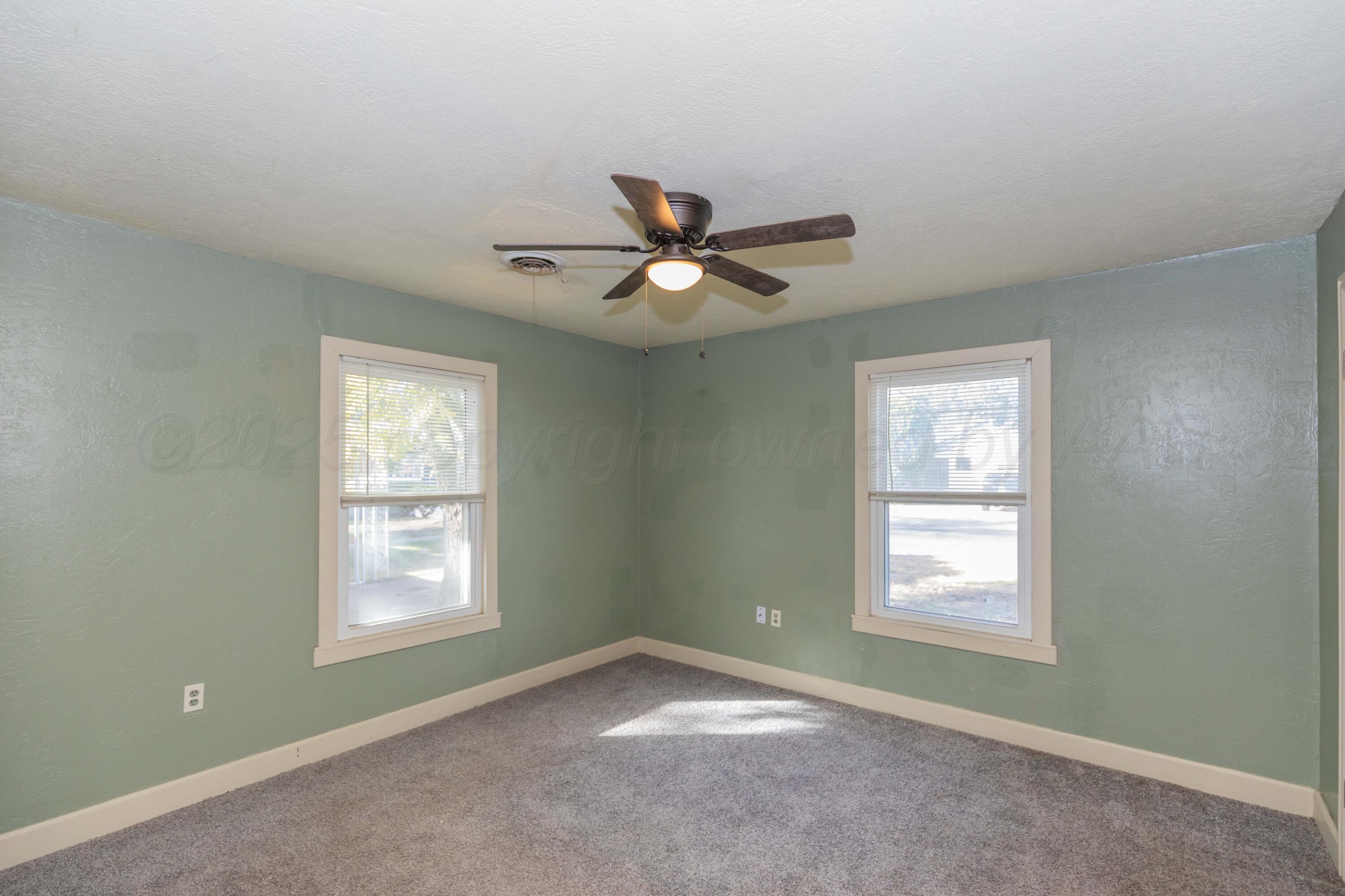 4209 South Lipscomb Street Amarillo, TX 79110 - Photo 14 of 31 a view of an empty room with a window