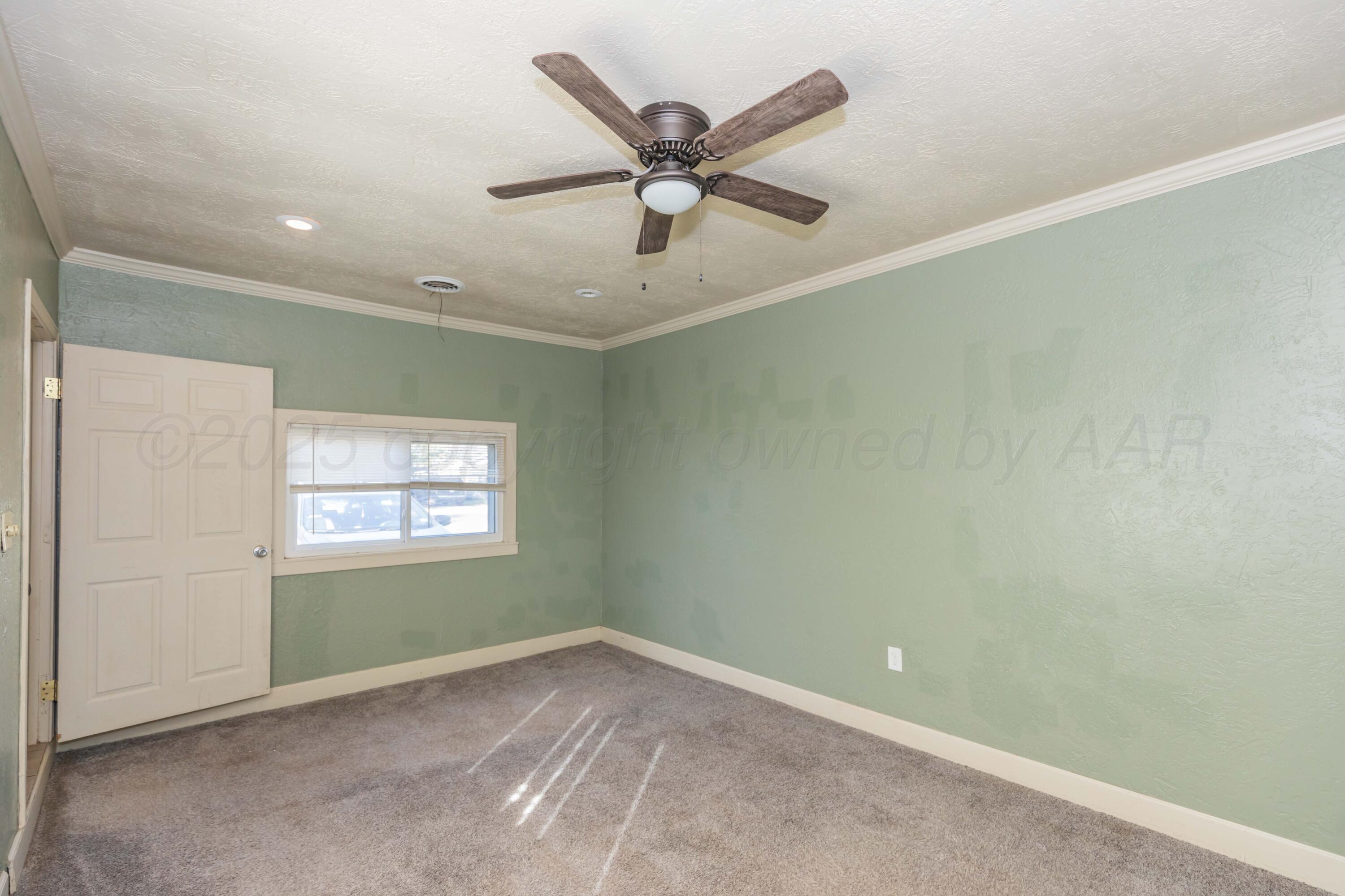 4209 South Lipscomb Street Amarillo, TX 79110 - Photo 28 of 31 a view of an empty room with a window