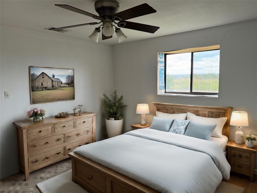 6096 Abner Road Kaufman, TX 75142 - Photo 13 of 21 a bedroom with a bed and a dresser in it