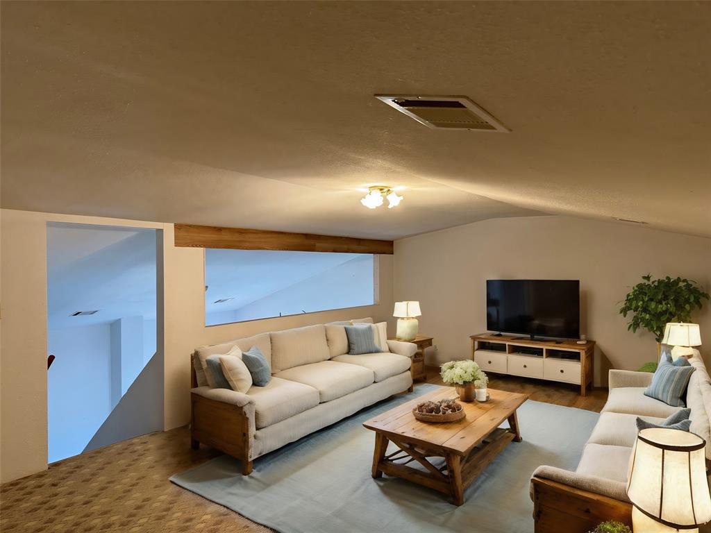 6096 Abner Road Kaufman, TX 75142 - Photo 14 of 21 a living room with furniture and a flat screen tv