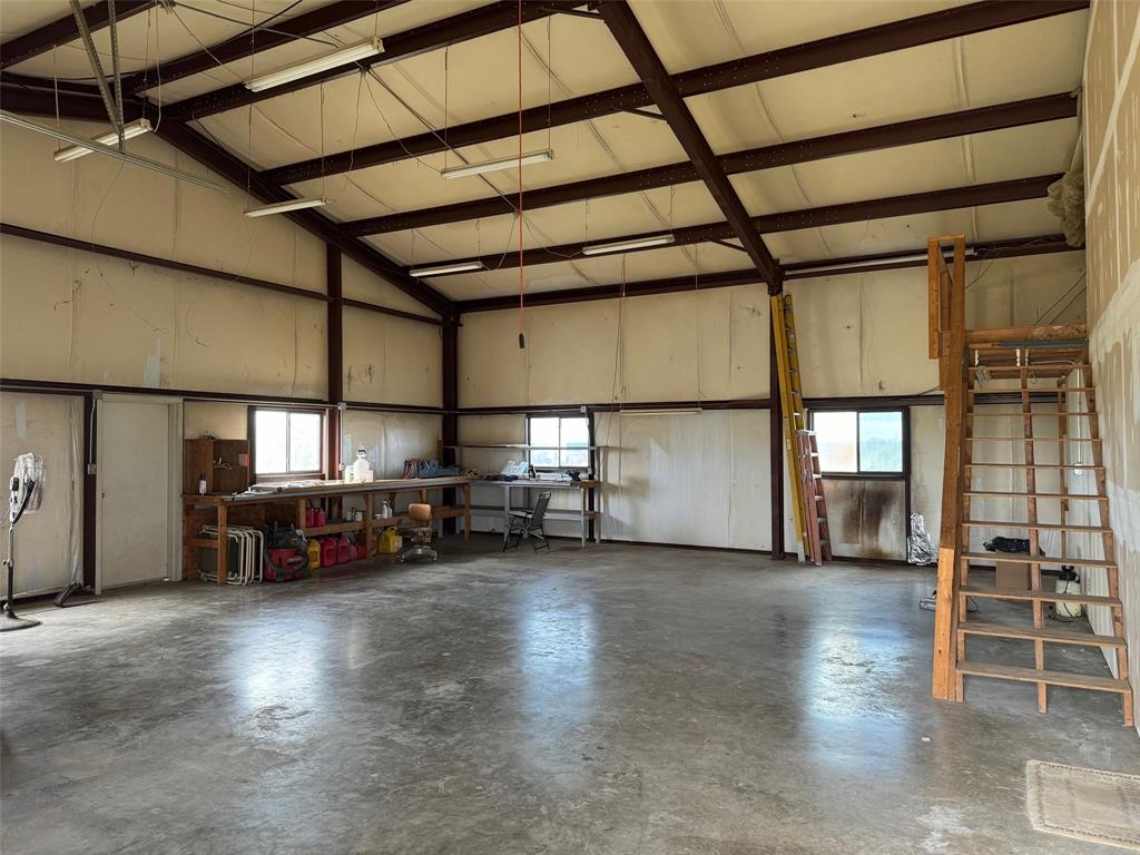 6096 Abner Road Kaufman, TX 75142 - Photo 15 of 21 a view of a garage with furniture