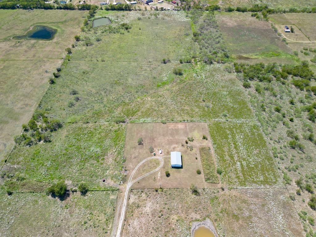 6096 Abner Road Kaufman, TX 75142 - Photo 19 of 21 an aerial view of a house with a yard